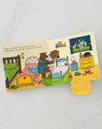 Goldilocks and the Three Bears: A Push, Pull and Slide book by Natascha Rosenberg