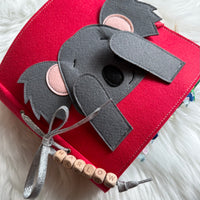 Felt busy book can be personalised with engraved wooden beads for birthday and Christmas gifts.